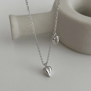 Minimalist S925 sterling silver necklace with double heart pendants and polished cable chain
