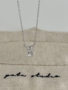 Detailed view of S925 silver necklace with marquise butterfly and square crystal pendant