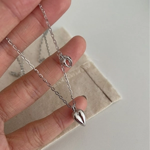 S925 sterling silver necklace featuring 3D solid and hollow heart pendants on thin chain
