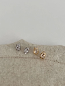 Detail view of tulip-shaped S925 silver stud earrings with sparkling cubic zirconia inlay