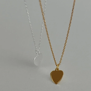 Set of two minimalist S925 silver heart pendant necklaces in gold and silver finishes
