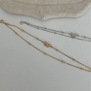 Elegant S925 silver double-layered bow bracelets with zircon in gold and silver finishes