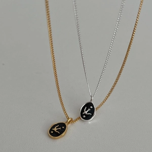S925 silver necklace featuring round swallow pendants in gold and silver finishes