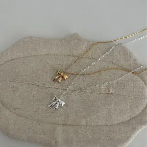 Elegant S925 silver bow pendant necklace in gold and silver finish for women