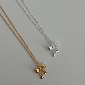 Elegant S925 silver bow necklaces in gold and silver finish with refined mirror polishing