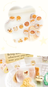 Close-up of cute animal-themed washi tape stickers sealing transparent snack bags