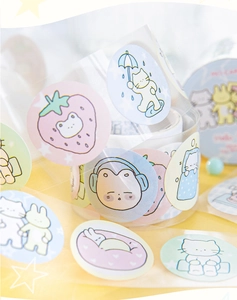Close-up of cute cartoon cat and rabbit round sticker sheets for DIY scrapbooking