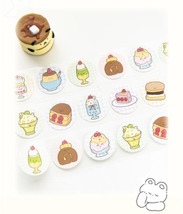 Close-up of cute cartoon dessert stickers featuring pudding and strawberry cake motifs