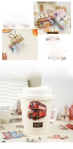 Macro view of London themed PET stickers featuring red bus and vintage architecture