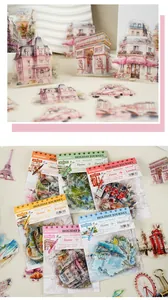 Macro detail of watercolor travel stickers featuring world landmarks and vintage cars