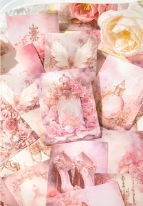 Baroque style scrapbooking paper featuring roses, perfume bottles and angel wings detail