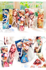 Close-up of laser finish elf fantasy bookmarks with floral girl illustrations