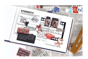 Macro shot of vintage lifestyle PET stickers with European shops and teddy bear on journal