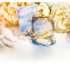 Detailed close-up of semi-transparent PET stickers with dreamy landscape and floral art