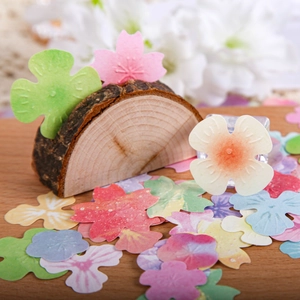 DIY floral scrapbooking paper pack with pastel flower petals and textured paper