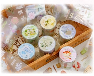 Detailed close-up of MO·CARD PET decorative tape rolls featuring floral and lifestyle themes
