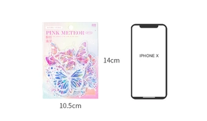 Autocollants laser papillon Pink Meteor montrant la taille par rapport à un mobile