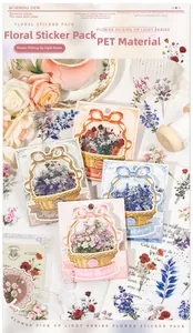 Détail d'autocollants en PET de fleurs vintage avec roses et lavande sur page de scrapbooking
