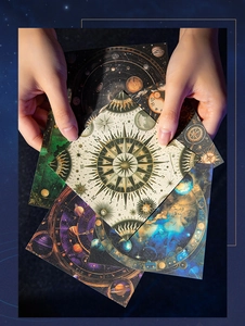 Close-up of square astronomical decorative papers featuring celestial and astrology patterns