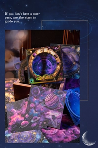 Detailed view of Star Fantasy celestial paper with gold foil constellations and planet motifs