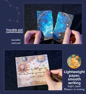 Detail of vintage starry sky theme scrapbook paper showing easy-tear edge and smooth writing