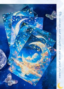 Macro detail of laser holographic postcards with moon and starry sky illustrations
