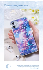 Close-up of clear phone case with lighthouse art and iridescent sparkling sequins