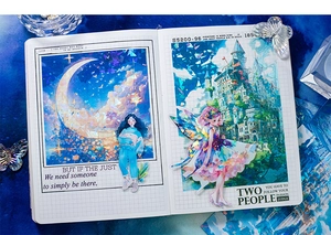 Close-up of holographic shell-light stickers with fantasy girl and castle designs