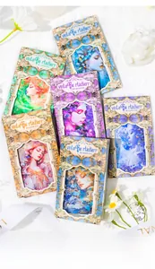 Detailed view of vintage goddess illustration stickers with ornate gold frames for journaling