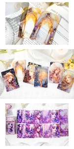 Close-up of holographic PET stickers featuring gothic arches and mythical portraits