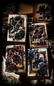 Macro detail of Dark Night Rose vintage scrapbooking paper with gothic floral cutout designs