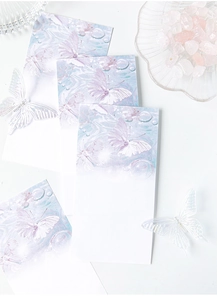 Artistic butterfly and water ripple notes displayed with glass props and soft lighting