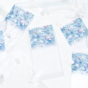 Poetic light blue memo pads with butterfly patterns and shimmering water textures
