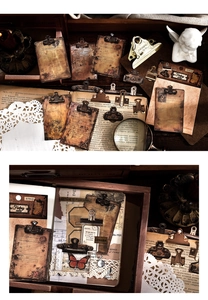 Dettaglio di un kit scrapbooking vintage con carte antiche e fermagli in metallo