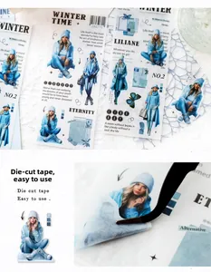 Macro detail of blue winter theme die-cut sticker being peeled with tweezers