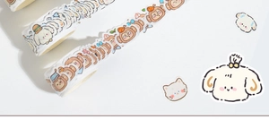 Macro detail of cute animal die-cut washi tape for scrapbooking and DIY journals