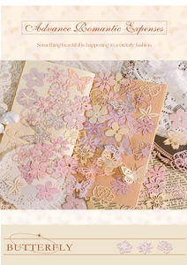 Détail de chutes de papier fleurs et papillons évidés pour scrapbooking vintage DIY