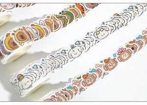 Close-up of cute animal washi tape rolls for scrapbooking and DIY craft decoration
