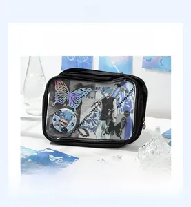 Detail of black ita bag with transparent window showing DIY anime badge decorations