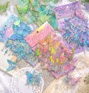 Detail view of 3D shell light butterfly stickers with laser finish for journaling