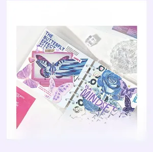Collage of butterfly and rose stickers from Dream Player collection in a ring binder