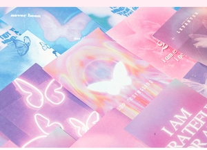 Macro shot of Dreamy Player butterfly deco cards with aesthetic neon gradients and quotes