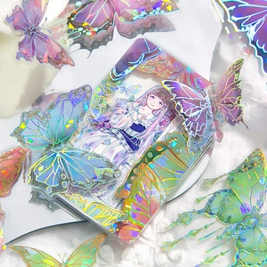 Dreamy holographic butterfly stickers on transparent toploader for photocard decoration