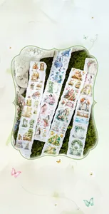 Macro detail of matte PET tape with vintage garden illustrations and floral patterns