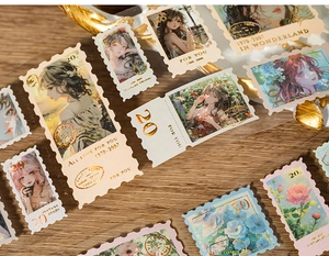 Close-up of vintage PET stamp stickers with gold foil details and anime floral designs