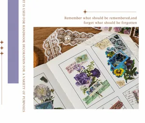 Macro shot of vintage stamp-style floral stickers with gold foil for journaling decor