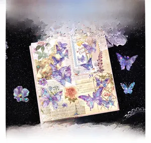 Macro detail of holographic butterfly floral stickers for vintage journaling and scrapbooking