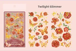 Detail of red rose and butterfly decorative stickers with a shimmering shell finish