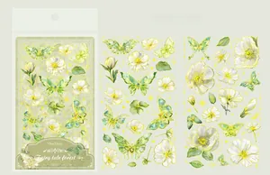 Detail of Fairy Tale Forest stickers featuring green butterflies and floral gold foil edges