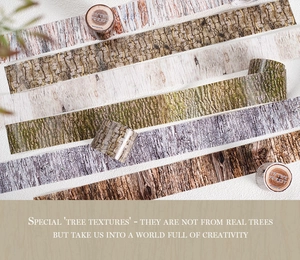 Macro detail of decorative washi tapes featuring realistic forest bark textures and wood patterns
